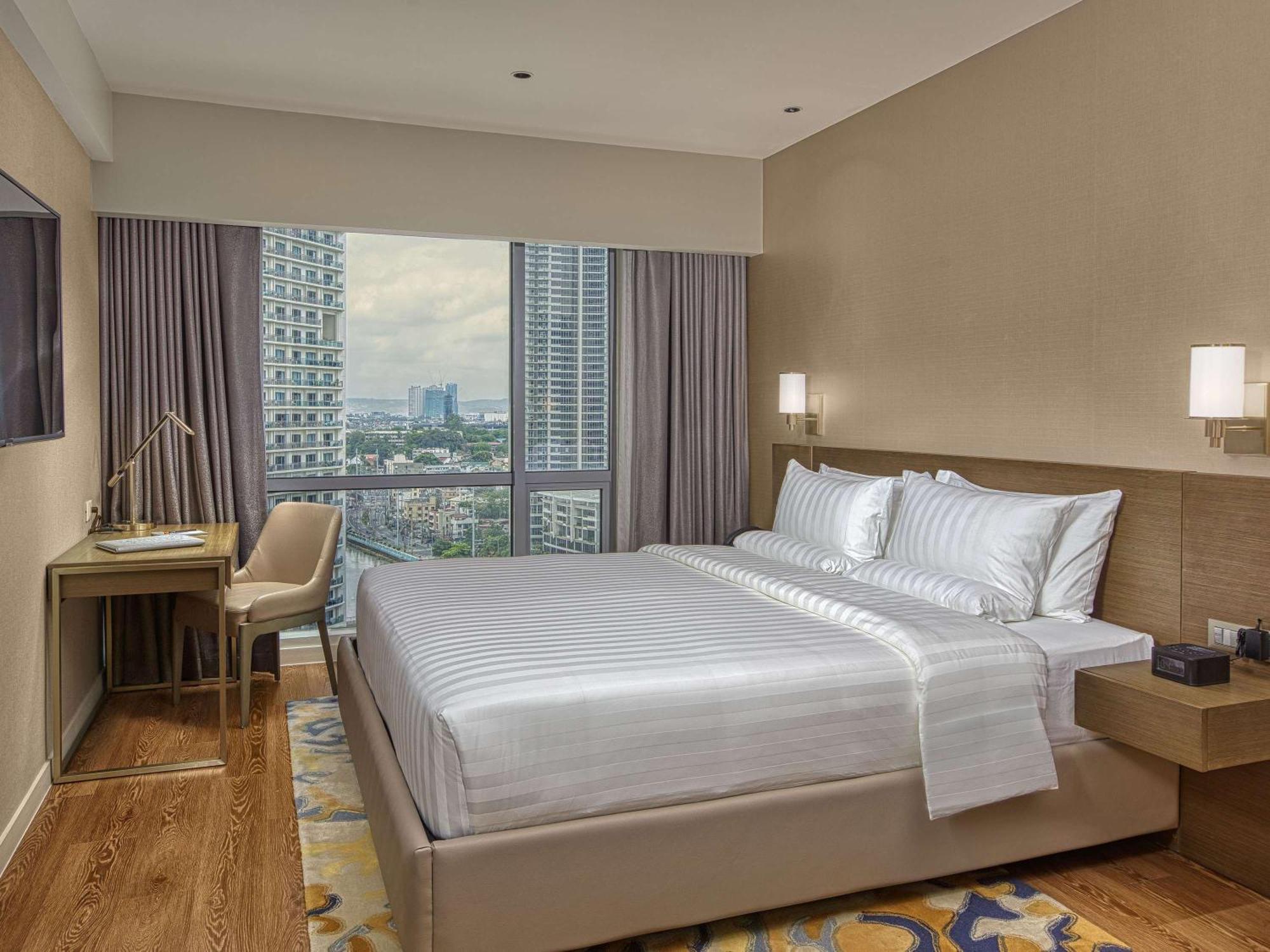 Novotel Suites Manila At Acqua マンダルヨン・シティ エクステリア 写真